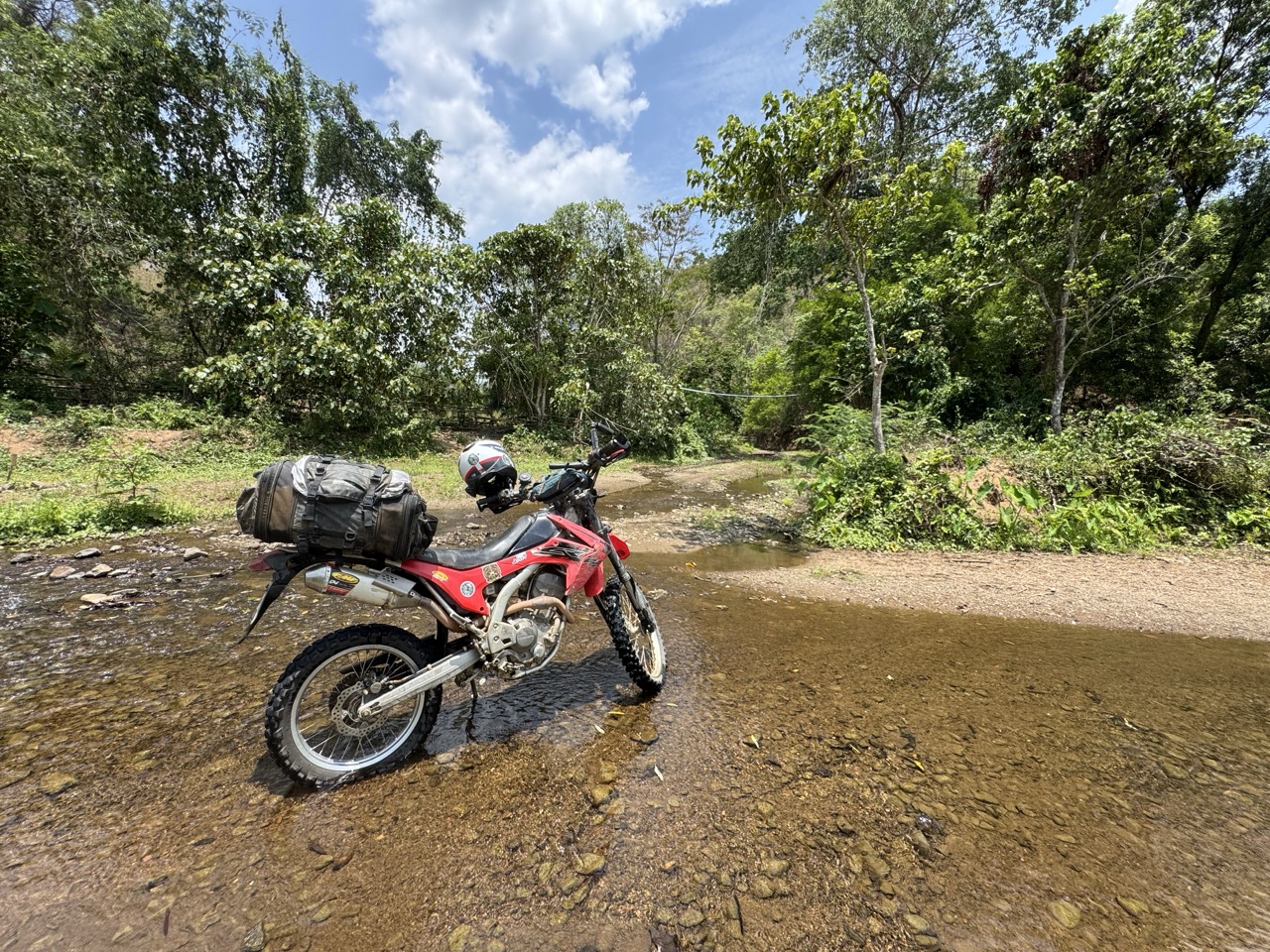 A breather in a shallow stream between Mae La Noi and Khun Yuam.