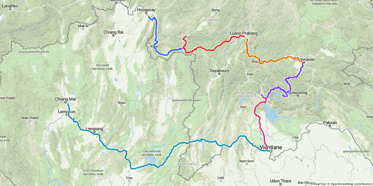 The full 7-day loop — Day 1 (blue), Day 2 (red), Day 4 (amber), Day 5 (violet), Day 6 (pink), Day 7 (cyan). About 1,715 km total. Day 3 was a rest day in Luang Prabang.