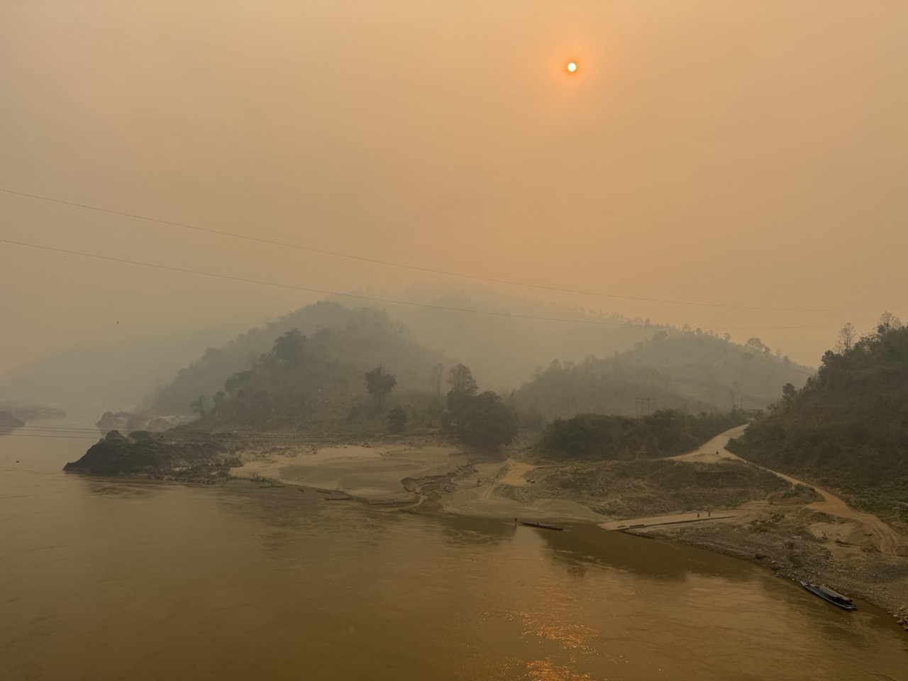 Red sun through smoke haze. April in northern Laos is unambiguous about what season it is.