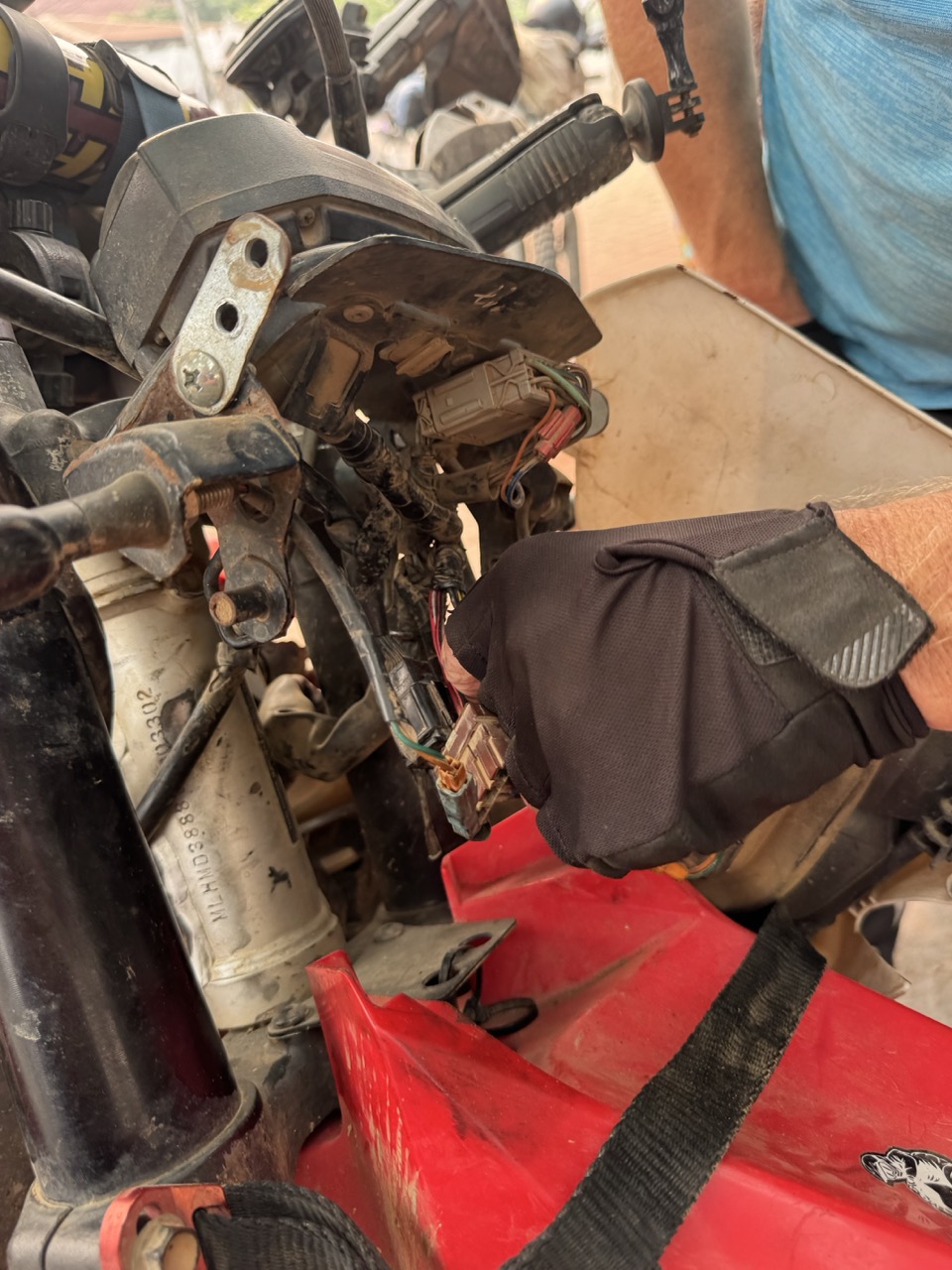 The actual problem — torn dashboard connector. The thing that was throwing warning lights.