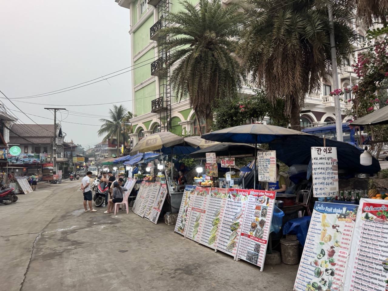 Korean menus on every street food cart in town. The Vang Vieng tourist demographic has shifted.