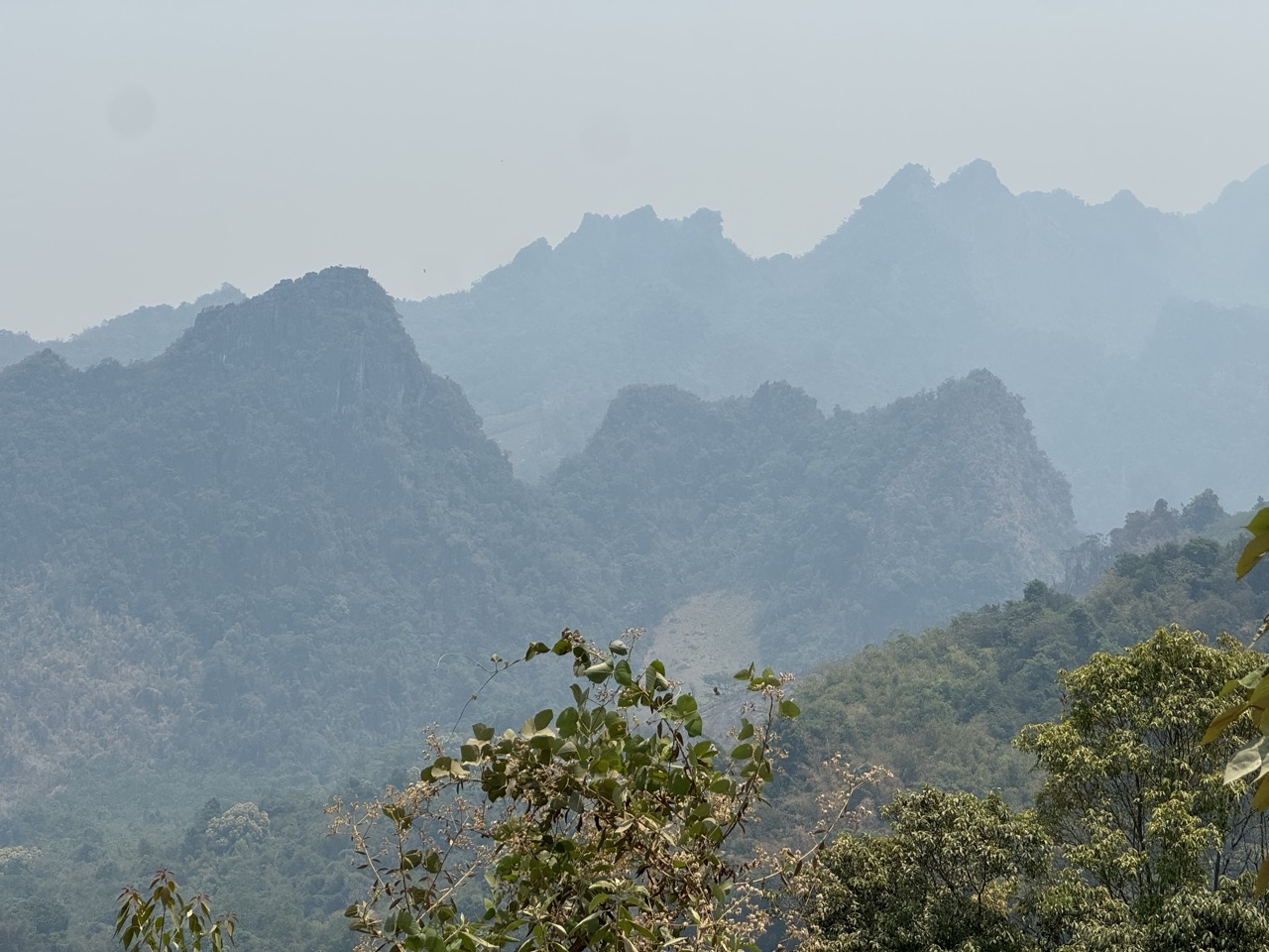 Distant karst peaks. Definitely Vang Vieng country now.