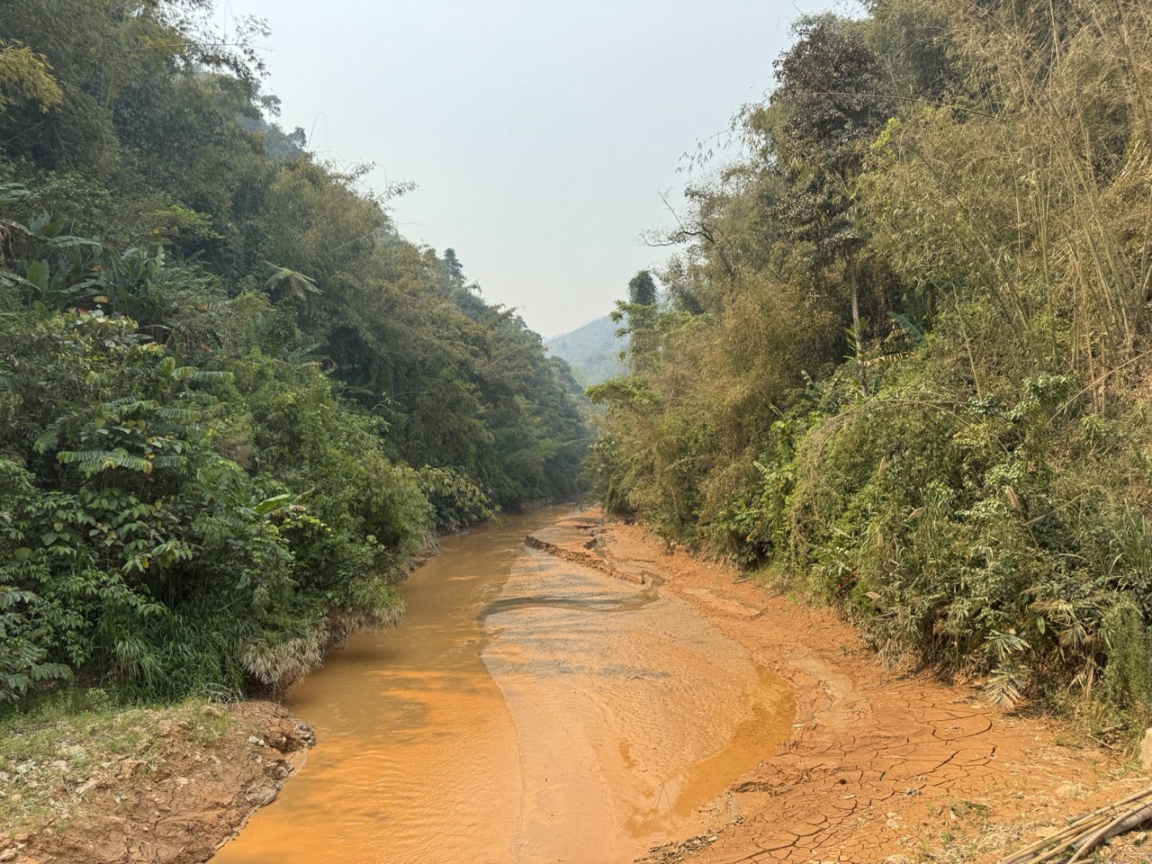 Orange-mineral stream bed in the next valley over. Different geology, different colour.