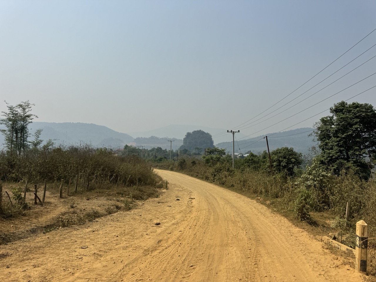 Red dirt road, straight as it gets in this country.