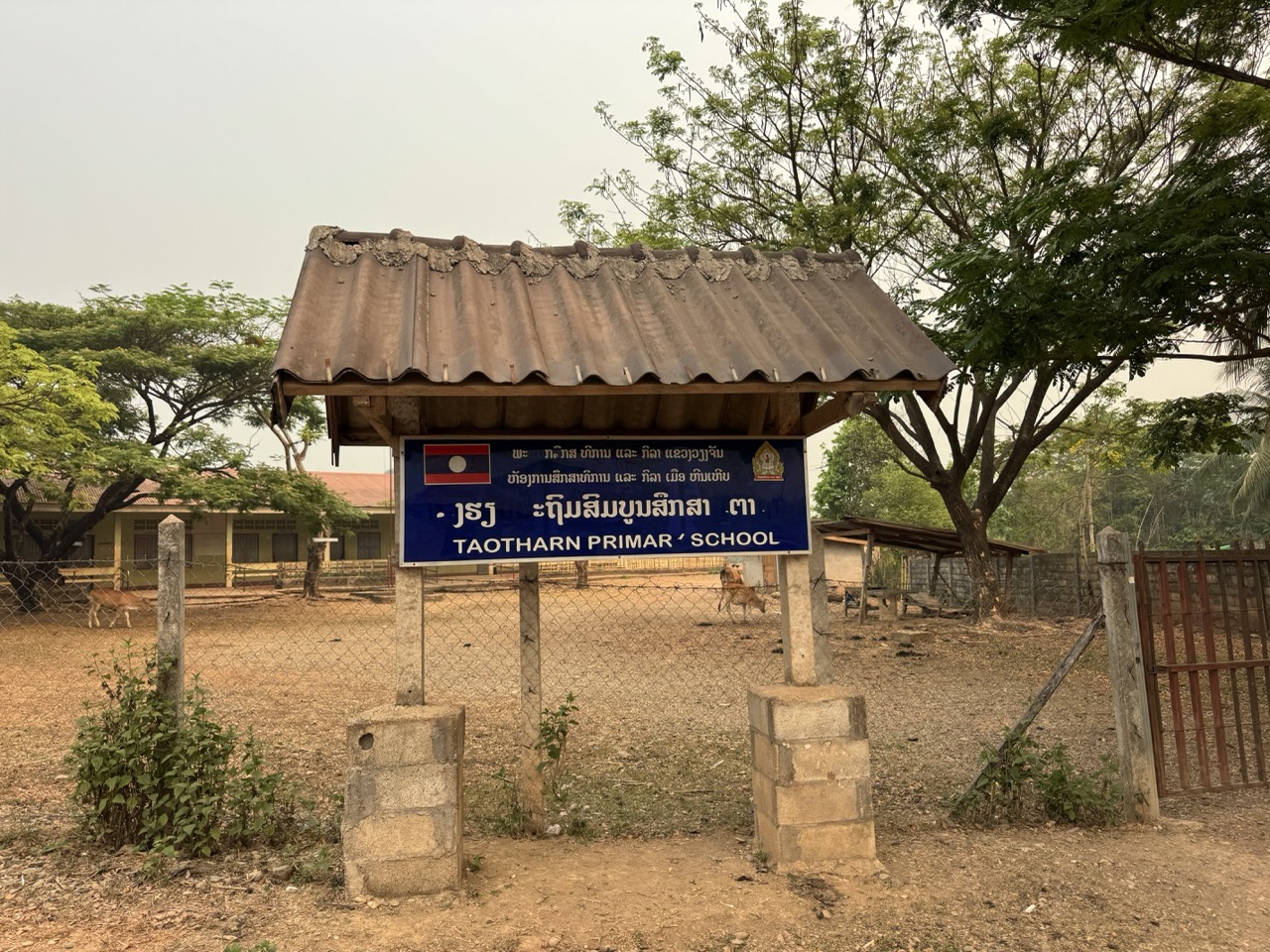 Taothan primary school gate. Most of the small towns south of Vang Vieng have one of these in the centre.