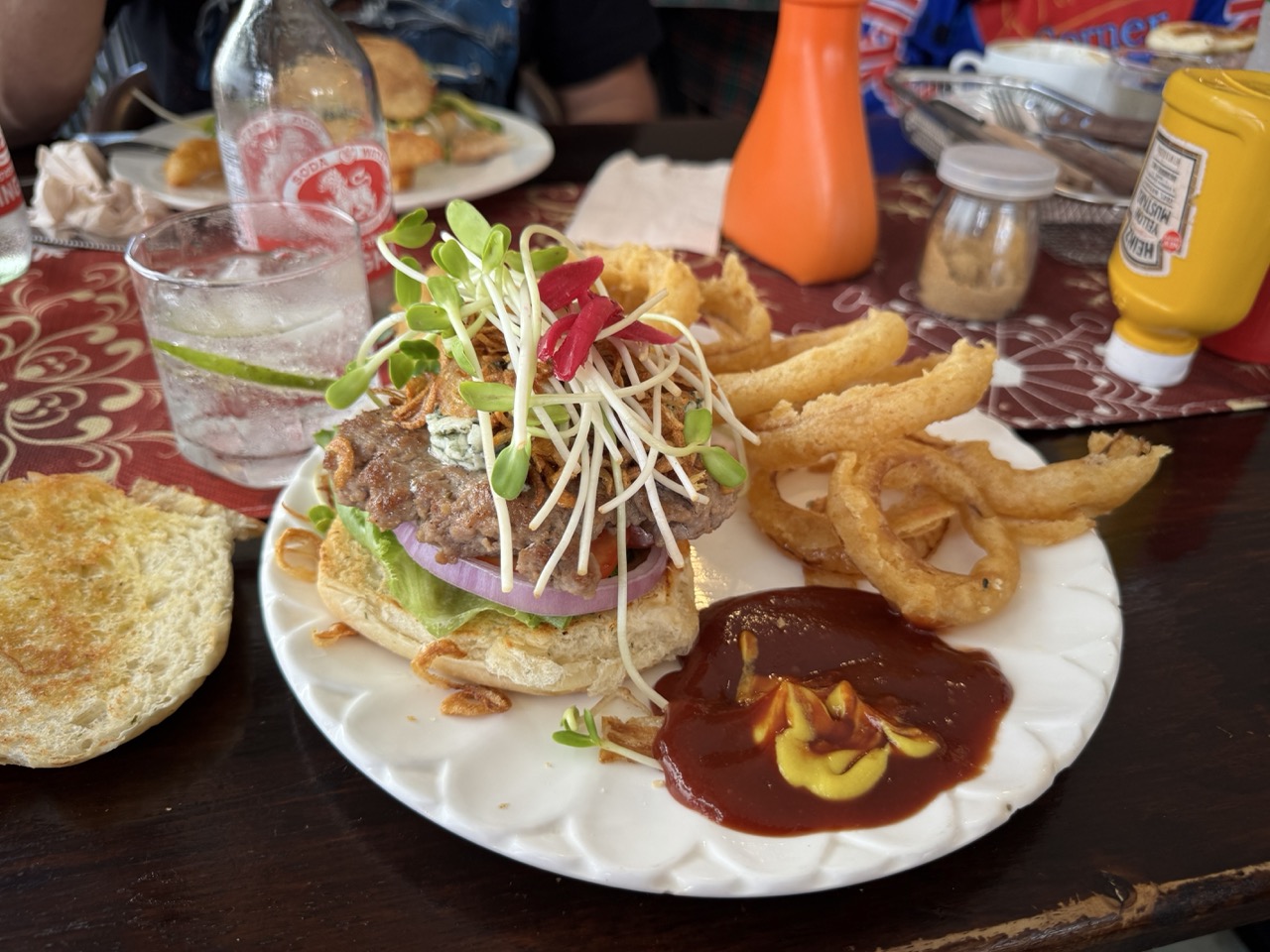 Surprise lunch in Chiang Rai before the border push — best burger of the trip and we never caught the name of the place.
