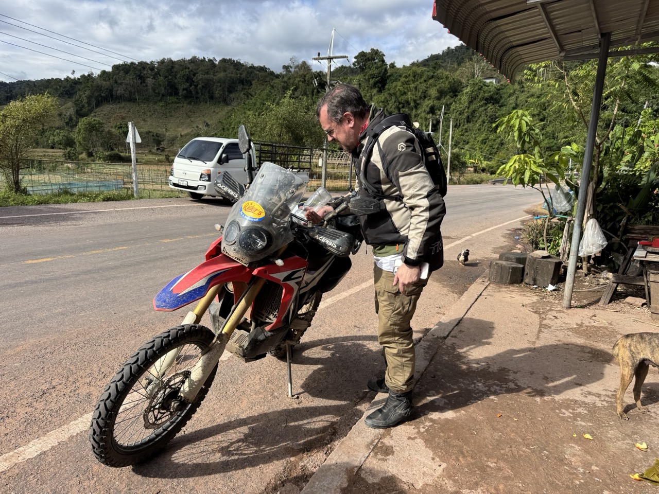 Refuel and stretch break in Hongsa — about a third of the way home.